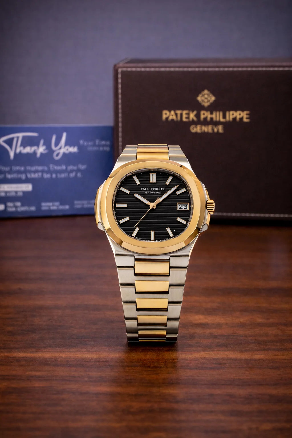 Patek Philippe Nautilus Two Tone Black and Gold