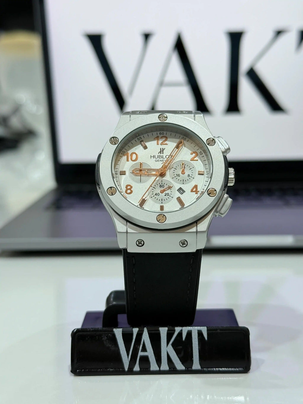Hublot the vision watch on a stand with 'VAKT' branding in the background