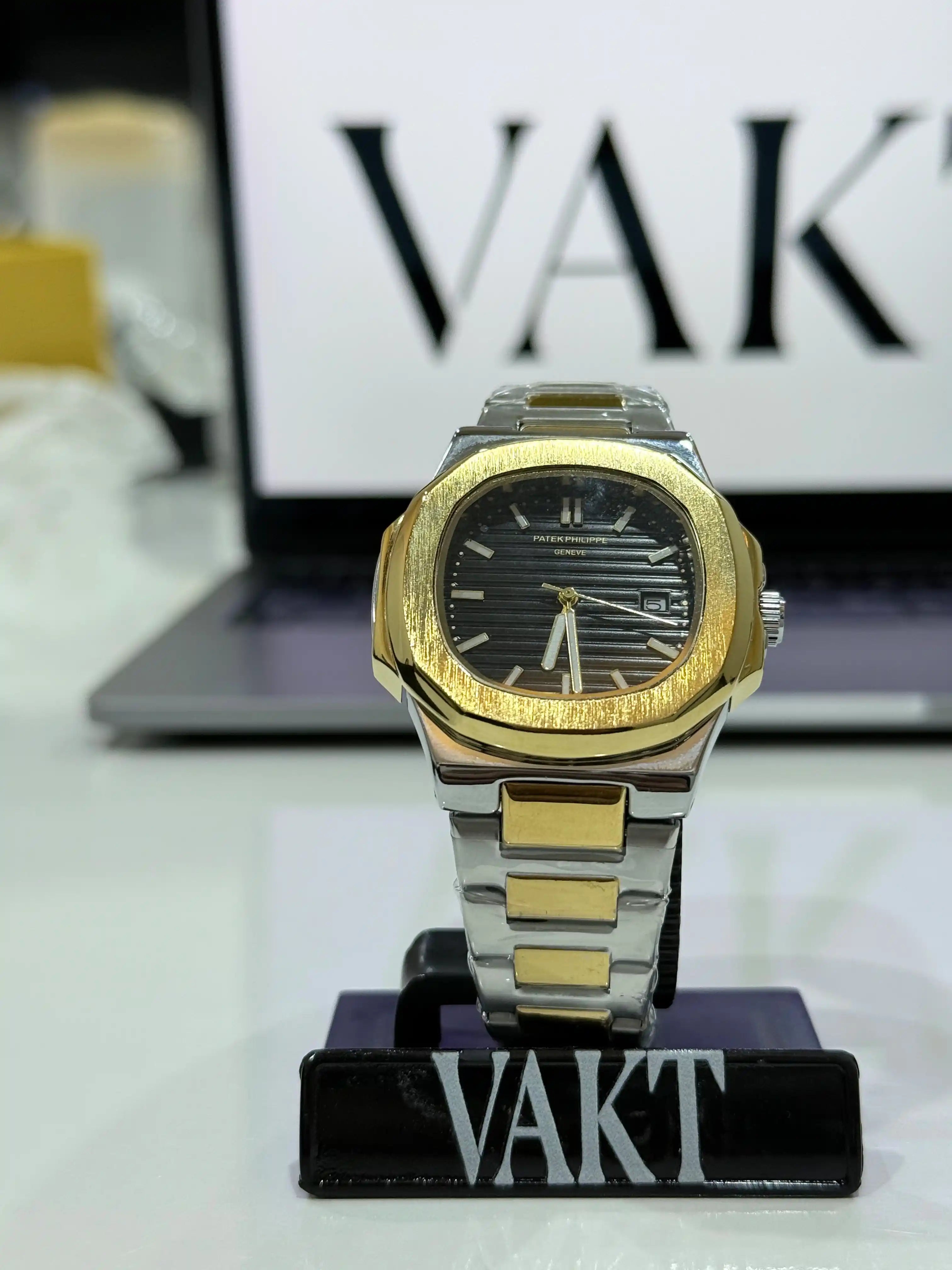 Patek Philippe Nautilus Two Tone Black and Gold